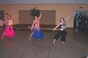Three Mirage dancers perform a number at a Purdue event.