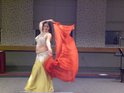 A dancer shows off her veil.