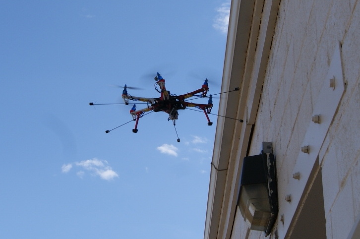 Dexterous Hexrotor flying near a structure for inspection